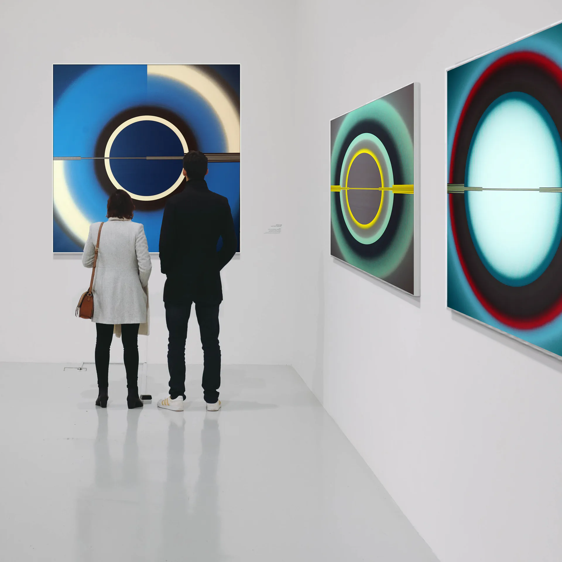 Pi Square exhibition view showing contemporary paintings in a gallery setting